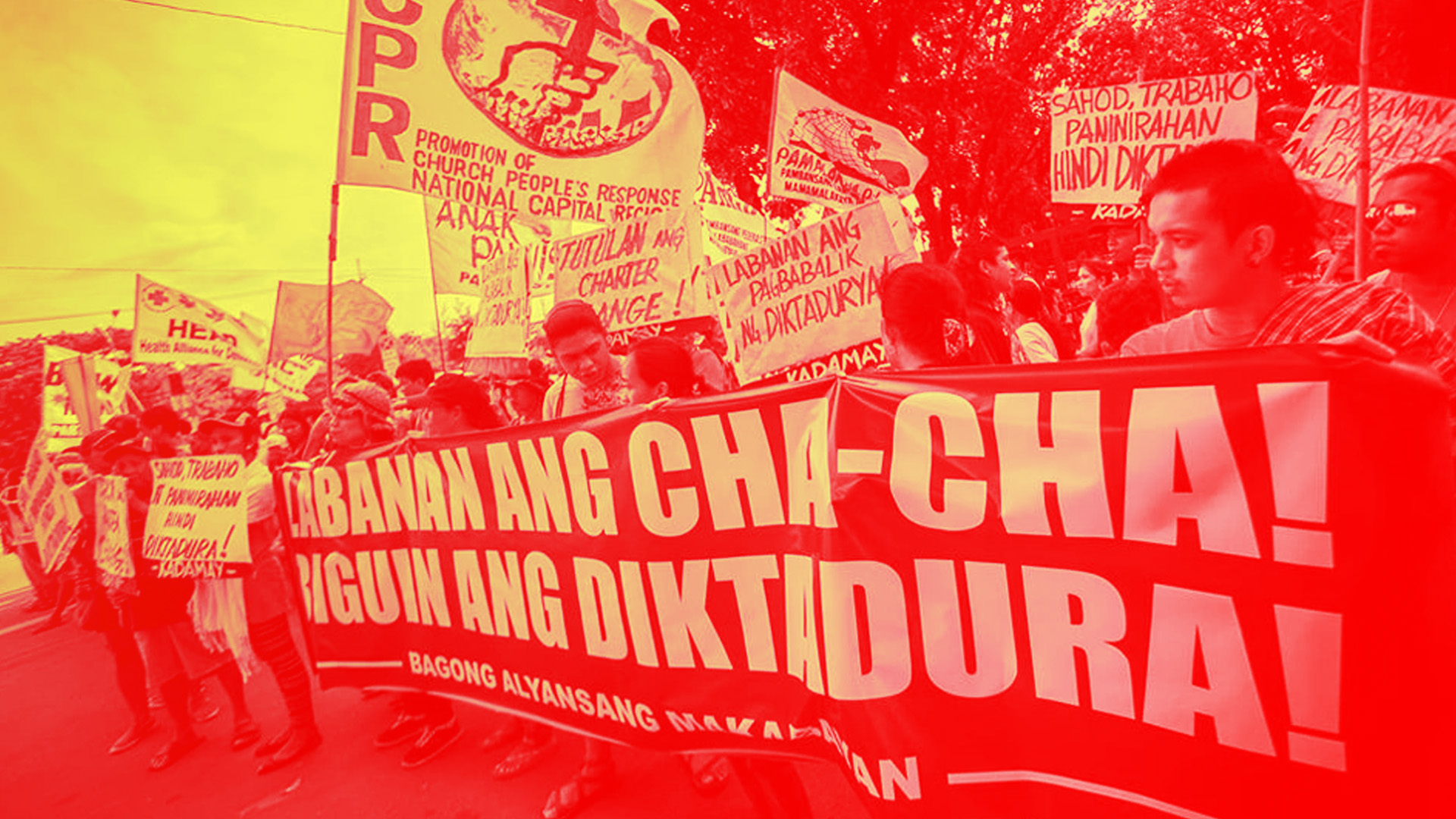 Protestors oppose charter change in the Philippines.